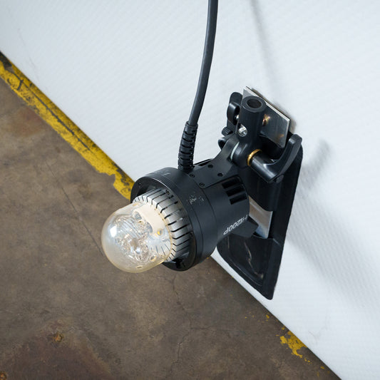 12x12 Overhead Lightbank - Inflatable Lightbank clipped to frame, ideal for portable photography lighting setups in studios or on location.