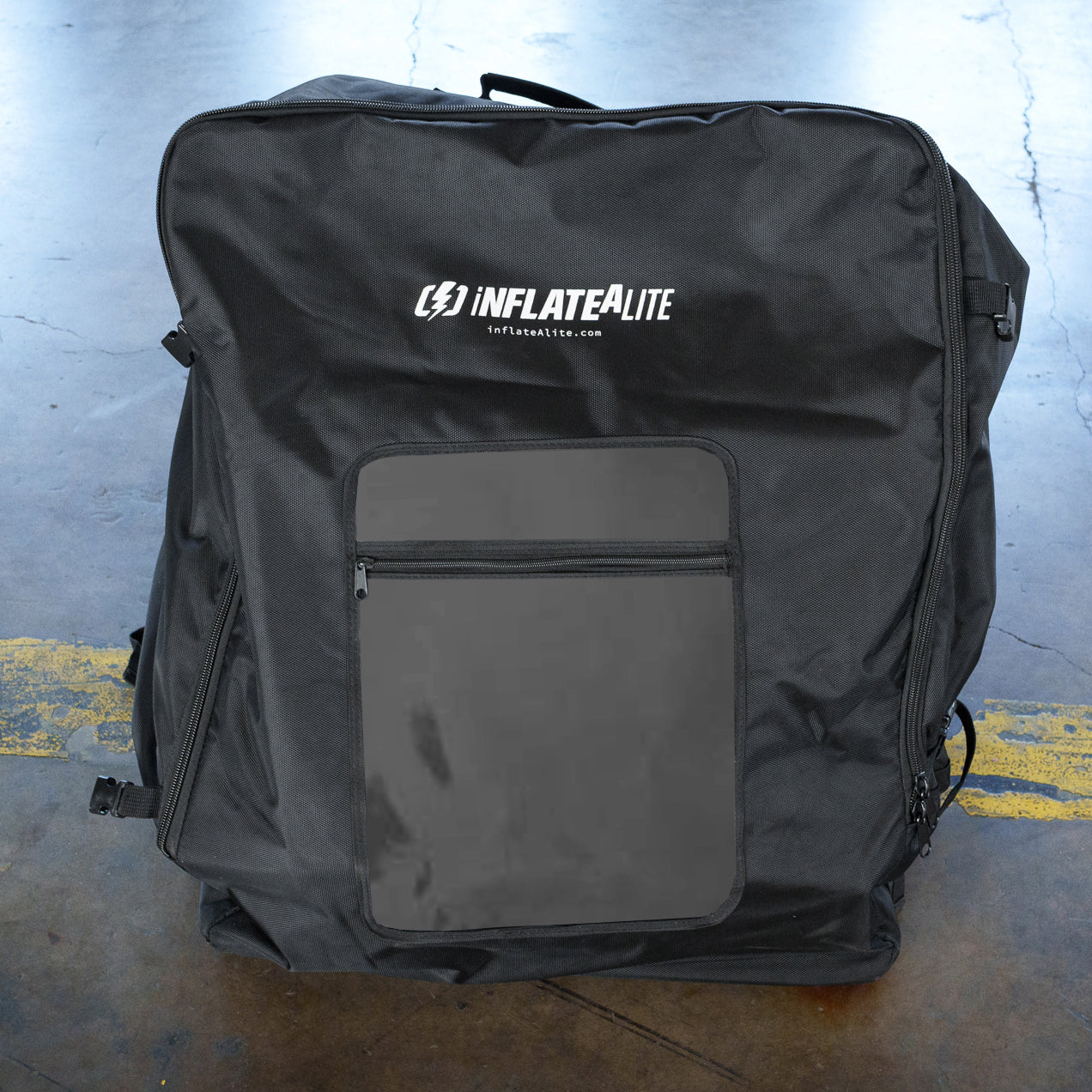 12x12 Overhead Lightbank in black Inflatealite carrying case, ideal for portable photography lighting setups and easy transport.
