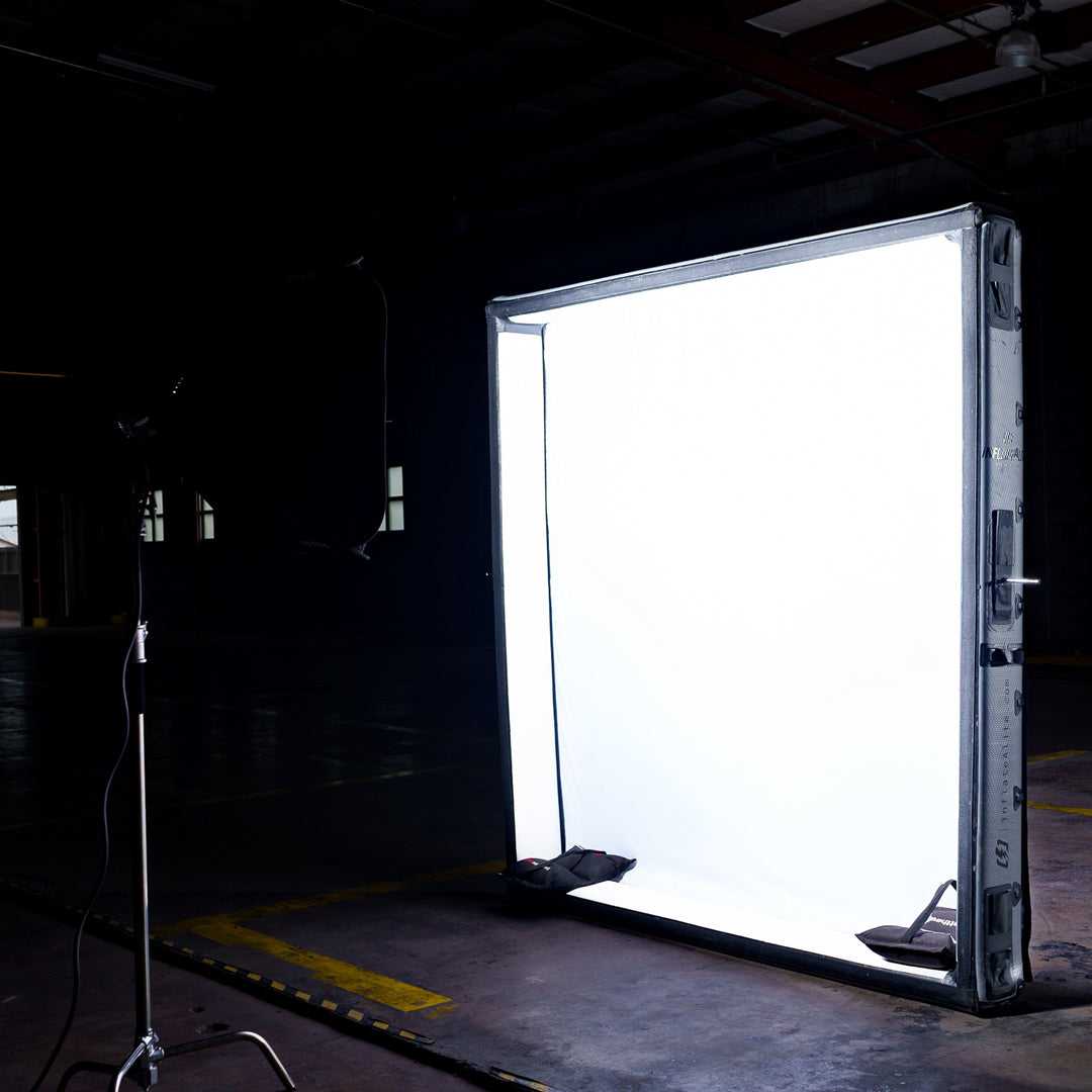 8x8 Butterfly Frame - Portable Frame Lighting setup in warehouse, providing soft light for professional photography and film shoots.
