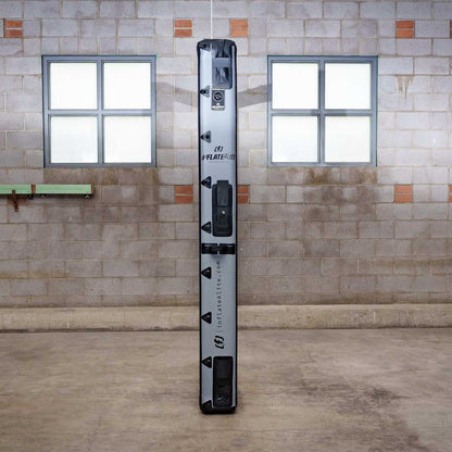 8x8 Butterfly Frame in compact inflatable case standing upright, ideal for portable frame lighting in professional soft light setups.